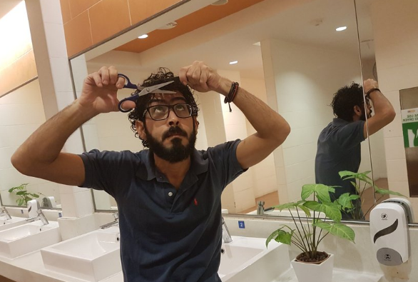 حسن القنطار لاجئ سوري علق في مطار ماليزي.. وحصل على إقامة دائمة في كندا!